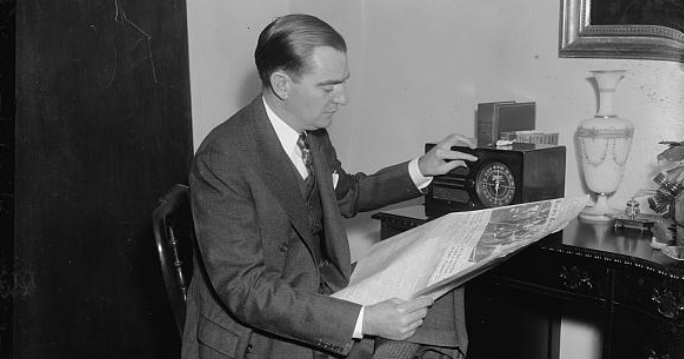 “A congressman’s day. 6:30 P.M. Home again, Rep. Thomas reads the hometown newspapers and listens to the latest radio news reports before dinner” (1937), Library of Congress.